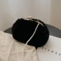 Black plush kiss-lock crossbody bag with elegant pearl chain for women winter fashion. - Pearl Chain / Black