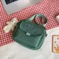 Solid color nylon small crossbody bag for women, cute college style daily shoulder bag. - Green with Bear