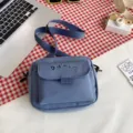 Solid color nylon crossbody bag, casual student messenger bag with front flap pocket. - Blue with Bear