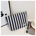 Blue and white striped canvas cosmetic bag with zipper, portable makeup storage pouch. - Linen Blue and White Stripes