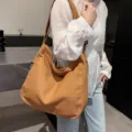 Casual canvas shoulder bag for women, large capacity daily tote and crossbody bag. - Brown