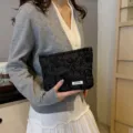 Portable black textured cosmetic bag, large capacity makeup pouch and travel toiletry organizer. - Stone Pattern Black