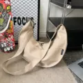 Beige solid color crescent shoulder bag with wide strap, casual large crossbody dumpling bag. - Khaki