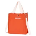 Orange canvas tote bag with shoulder strap, casual daily handbag for women, front pocket design. - Orange