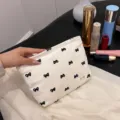 Portable canvas makeup bag with cute black bow print, large capacity cosmetic storage pouch for women. - White Bow Pattern