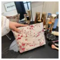 Floral embroidered cosmetic bag, portable fabric makeup storage pouch with large capacity. - Gold Wire Red Plum