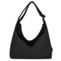 Close-up of black canvas shoulder bag, featuring minimalist hobo style and durable material. - Black