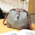 Stylish retro women's shoulder bag with metal lock and rivet decoration for daily use. - Gray
