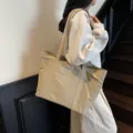 Large capacity khaki canvas tote bag, casual daily shoulder bag with multiple exterior pockets. - Army Green
