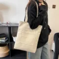 Solid color canvas tote bag with front pocket, large capacity casual shoulder bag for daily use. - Style 2 / White