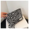 Zebra pattern knitted makeup bag, portable cosmetic pouch and storage bag detail. - Black Zebra Pattern