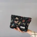 Women fabric cosmetic bag with colorful butterfly pattern, stylish makeup pouch for daily use. - Butterfly with Black Background
