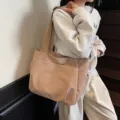 Minimalist solid color khaki canvas tote bag, versatile casual shoulder bag for women daily use. - Khaki