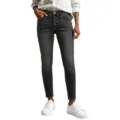 Close-up of high-waisted dark grey skinny jeans with metal button-fly and vintage washed details. - S / Black