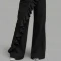 Black women's flare denim pants with chic asymmetrical ruffle design for spring and summer. - S / Black