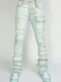 Detail view of light blue distressed stacked cargo jeans for men with multiple pockets. - S / Light Blue