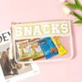 Clear PVC cosmetic bag with SNACKS chenille letters, large capacity toiletry bag for travel. - SNACKS / Beige