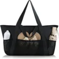 Detail view of the black mesh beach tote bag featuring front pockets and sturdy handles. - Solid Black