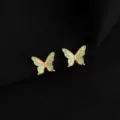 Modische Schmetterling Clip-Ohrringe mit Emaille-Design und vergoldeter Metallrand. - Doppelschicht-Ohrclips - Rosa Blauer Schmetterling
