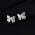 Detailansicht silberne Schmetterling Clip Ohrringe mit Struktur und schickem Design. - Schmetterling
