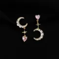 Detailed view of asymmetrical moon star pink heart clip-on earrings with sparkly cubic zirconia. - Non-pierced Spiral Clip-on Earrings / Star Moon Zirconia