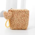 Plush leopard print cosmetic bag with heart pendant and portable strap, small makeup pouch. - Yellow