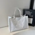 White crinkled pvc paper texture tote bag with large capacity for stylish daily wear. - White
