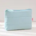 Light blue quilted cosmetic bag, fluffy travel makeup pouch, waterproof zipper storage bag. - 25x17cm / Blue