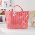 Stylish orange and purple striped PVC tote bag, waterproof large capacity shoulder handbag. - Striped Orange Pink