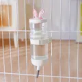 Distributeur d'eau suspendu pour animaux, chiens et chats, oreilles de lapin et bec en inox. - Grand 950ml / Blanc
