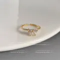 Vergoldeter offener Ring mit funkelndem Zirkonia Schleifen-Design, elegantes Schmuckstück. - Offen Verstelbar / 3D-Schleifen-Stil (Dick echtvergoldet)
