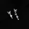 Detailed view of elegant silver butterfly clip-on earrings with shimmering stones and dangle design. - Double Layer Clip-On Earrings / Asymmetric Butterfly