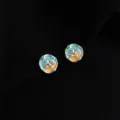 Close-up detail of double-layer flower enamel clip-on earrings with vibrant blue and yellow. - Double Layer Clip-On Earrings / Monet Lotus Pond