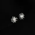 Detailed view of silver tone double layer starburst clip on earrings with bead tips. - Double Layer Clip-On Earrings / Small Fireworks
