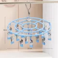 Stainless steel round sock drying rack with multiple clips in blue color for easy laundry hanging. - Round 24 Clips / Nordic Blue