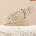 Ceinture tressée élastique beige femme avec boucle ardillon argentée détail élégant. - Beige