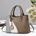 Color block handbag detail, soft leather shoulder bag with double handles and metal hardware charm. - Khaki