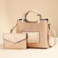 Detailed view of women PU leather handbag and clutch set with crocodile texture and gold hardware. - Khaki + Small Pouch