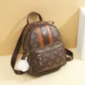Chic brown monogram women's backpack with fluffy pom-pom charm, stylish casual travel bag. - Large Embossed Style / Coffee