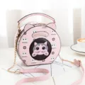 Pink cute cat round shoulder bag for women, stylish cartoon crossbody bag with chain strap. - Pink