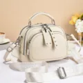 Chic beige women shoulder crossbody bag with wide strap and multi zipper design style. - Rivet Zipper / White
