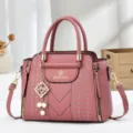 Pink women's handbag retro PU leather shoulder crossbody bag with top handles and charm. - Pink