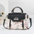 Stylish women handbag with top handle, chic print pattern, versatile shoulder crossbody bag. - Black and White