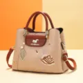 Chic Chinese style embroidered women handbag with top handle and crossbody strap for daily commute. - Squirrel Carnation - Brown