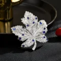 Stunning blue zircon maple leaf brooch, elegant silver-tone crystal lapel pin for women. - Blue