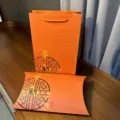 Orange gift bag pillow box set with elegant oriental window pattern for scarves jewelry packaging detailing - Handheld / 32.5x21x5.5cm
