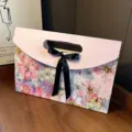 Floral envelope gift box featuring a black ribbon bow for elegant scarf and shawl packaging. - 35x23x8cm / Pink Floral Envelope Box