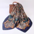 Detailed view of luxury leopard and chain print silk square scarf, elegant fabric texture. - 90cm / Dark Blue Leopard Print Chain