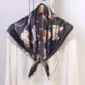Detailed view of luxury black satin square scarf with elegant rose and chain print design. - 90cm / Black Rose Chain
