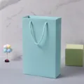 Turquoise paper gift bag, stylish boutique shopping bag with rope handles. Variant color. - Light Blue Set Outer Carrying Box